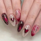GETADME 24Pcs Black Y2k Long False Nails with Almond Head Design Cat's Eye Silver Stripe Pattern Press on Fake Nails Wearable Nail Tips