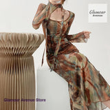 GETADME French-style fashion halo-dyed gauze printed ribbon dress women's spring and summer pleated waist slim lantern sleeve dress