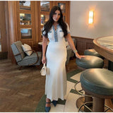 GETADME Elegant Denim Patchwork Knitted Long Dress Women Fashion V Neck Short Sleeved Buttons Bodycon Dresses Female White Pockets Robes