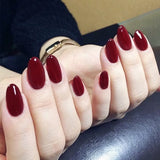 GETADME 24Pcs Short Oval Head Blush Pink Press on Nails with Simple Designs Almond Nails Wearable Acrylic Full Cover Nail Tips with Glue