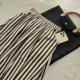GETADME Retro Chic Solid Color Striped Skirt for Women in Summer, High Waisted and Slimming A-line Mid Length Umbrella Skirt