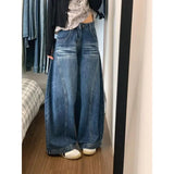 GETADME Chic American Street Style Vintage Curved Hem Jeans Women Edgy Design Loose Fit Slimming Wide Leg Floor Length Denim Pants