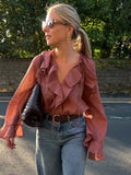 GETADME Elegant Ruffles Flared Sleeve Oversized Shirt For Women Chic V-neck Solid Cropped Blouse 2025 Office Lady Commute Streetwear New