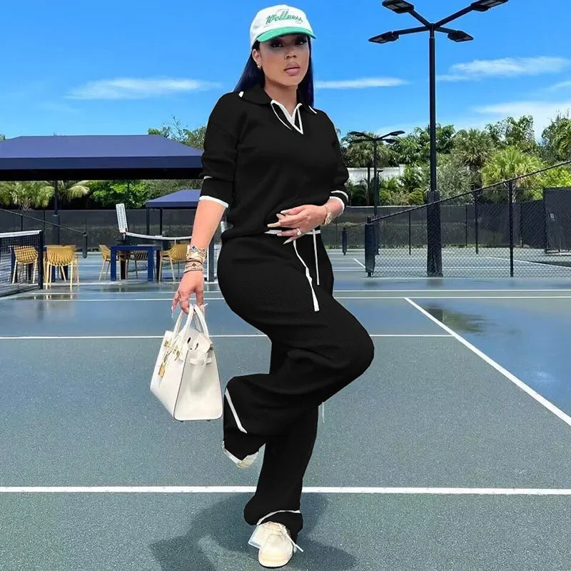 Ensemble de survêtement décontracté en maille GETADME Active Wear pour femme, deux pièces, haut rayé sport et pantalon large, idéal pour le jogging.
