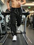 GETADME Men's Lightweight Quick-Dry Striped Logo Printed Joggers with Drawstring Streetwear Pants for Gym Daily Spring Summer