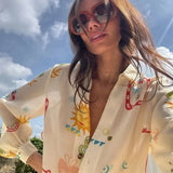 GETADME 여성 패션 신축성 허리 투피스 세트 우아한 꽃무늬 라펠 긴팔 상의 짧은 바지 정장 캐주얼 휴가 복장