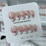 GETADME 10Pcs Cute Cat Eye Almond Fake Nail Blue Shiny with Small Rhinestone Nail Art Nude Color Short Oval Finished Artificial Manicure
