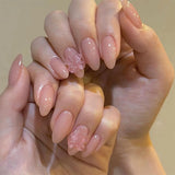 GETADME 24Pcs Short Oval Head Blush Pink Press on Nails with Simple Designs Almond Nails Wearable Acrylic Full Cover Nail Tips with Glue