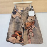 GETADME Womens Baggy Denim Shorts Vintage Washed Teddy Bear Print Wide Leg Mid Length Casual Streetwear Loose Jean Culottes for Women