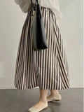 GETADME Retro Chic Solid Color Striped Skirt for Women in Summer, High Waisted and Slimming A-line Mid Length Umbrella Skirt