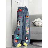 GETADME Retro American Cartoon Floing Embroidery Jeans Men Women Cleanfit Waed Loose Wide Leg Pants Couples Casual Loose Fit
