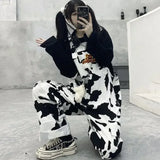 GETADME Street Hip-hop Harajuku Girl Cow Print Oneies for Women Black White Plaid Overalls Casual Jumpsuit Trousers Baggy Pants
