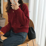 GETADME 2025 Hauts à manches longues style vintage Y2K, cardigan coréen en maille, pull polyvalent à col rond et coupe amincissante, idéal pour l'automne et l'hiver.