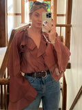 GETADME Elegant Ruffles Flared Sleeve Oversized Shirt For Women Chic V-neck Solid Cropped Blouse 2025 Office Lady Commute Streetwear New
