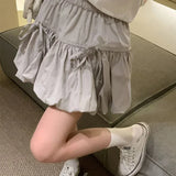 GETADME Sweet Bowknot A Line Skirts for Women 2025 Korean Style Pleated Cake Short Skirts Woman Summer Solid Color High Waist Mini Skirt