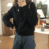 GETADME 2025 Hauts à manches longues style vintage Y2K, cardigan coréen en maille, pull polyvalent à col rond et coupe amincissante, idéal pour l'automne et l'hiver.