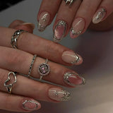 GETADME 24Pcs Black Y2k Long False Nails with Almond Head Design Cat's Eye Silver Stripe Pattern Press on Fake Nails Wearable Nail Tips
