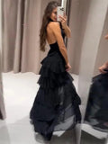 GETADME Elegant Ruffle Party Dress Women Sexy Backless Sleeveless Halter Female Dresses 2025 Summer Chic Irregular Hem Black Lady Robe