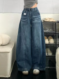 GETADME Chic American Street Style Vintage Curved Hem Jeans Women Edgy Design Loose Fit Slimming Wide Leg Floor Length Denim Pants