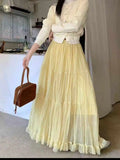 GETADME Elegant Pleated Skirt for Women with Elastic Waist Slim Fit A-Line Long Design Spring 2026 Fashion Trend