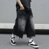 GETADME Men's Loose Ripped Denim Jeans 7 Point Calf Length Wide Leg Trousers Distressed Holes Frayed Hem Streetwear Casual Pants