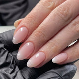 GETADME 24Pcs Short Oval Head Blush Pink Press on Nails with Simple Designs Almond Nails Wearable Acrylic Full Cover Nail Tips with Glue