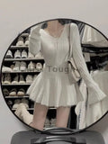 GETADME Winter Sexy Elegant Knitted Dress Woman Lace Up Design Sense Harajuku Slim Sweater Dresses New Solid Chic Mini Party Dress 2025