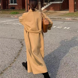 GETADME Women Elegant Long Woolen Coat with Belt Autumn Winter New Fashion Solid Lapel Long Sleeve Chic Outerwear Ladies Casual Overcoat