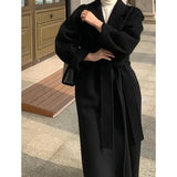 GETADME Women Elegant Long Woolen Coat with Belt Autumn Winter New Fashion Solid Lapel Long Sleeve Chic Outerwear Ladies Casual Overcoat