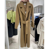 GETADME Women Elegant Long Woolen Coat with Belt Autumn Winter New Fashion Solid Lapel Long Sleeve Chic Outerwear Ladies Casual Overcoat