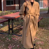 GETADME Women Elegant Long Woolen Coat with Belt Autumn Winter New Fashion Solid Lapel Long Sleeve Chic Outerwear Ladies Casual Overcoat