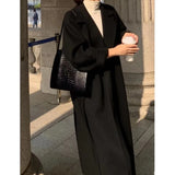 GETADME Women Elegant Long Woolen Coat with Belt Autumn Winter New Fashion Solid Lapel Long Sleeve Chic Outerwear Ladies Casual Overcoat