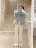 Pantalon droit en laine GETADME, taille haute, jambes larges, idéal pour l'automne et l'hiver. Coupe ample et fluide.