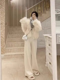 Pantalon droit en laine GETADME, taille haute, jambes larges, idéal pour l'automne et l'hiver. Coupe ample et fluide.