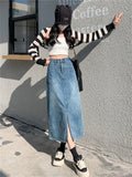 Jupe en jean bleu rétro mi-longue pour femme, collection printemps-été, style urbain simple, poches, coupe droite fendue, style trapèze.